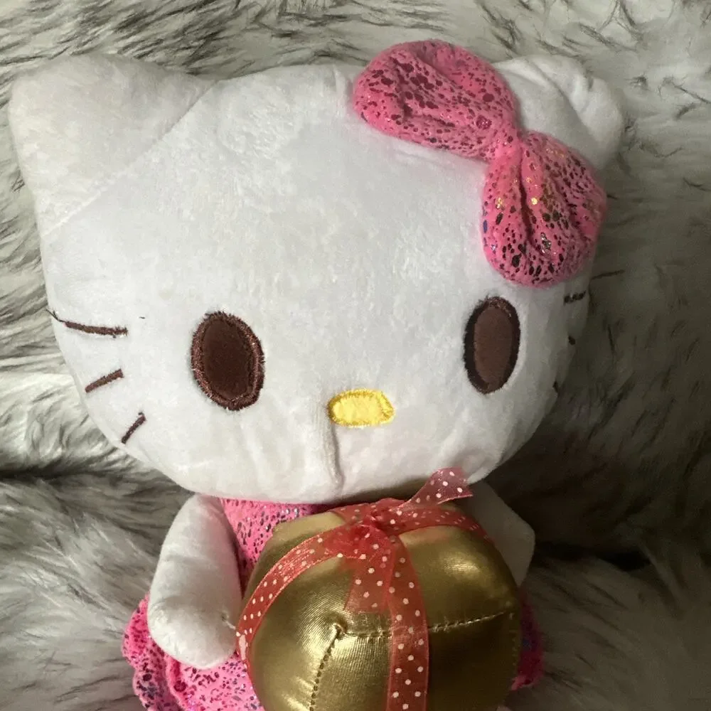 Hello Kitty Plush Pink Dress Holding A Present